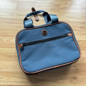 Blue Toiletry Bag with Brown Accents and Smooth Material